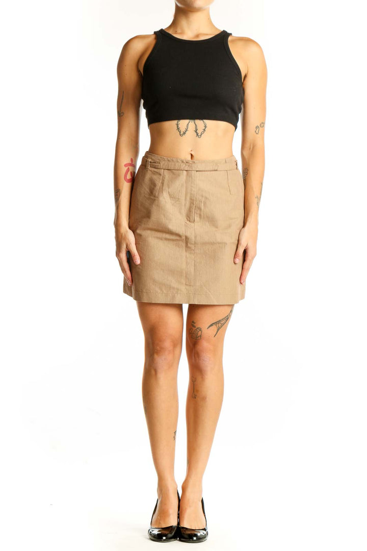 Front view of tan New York Industrie mini skirt with belt loops