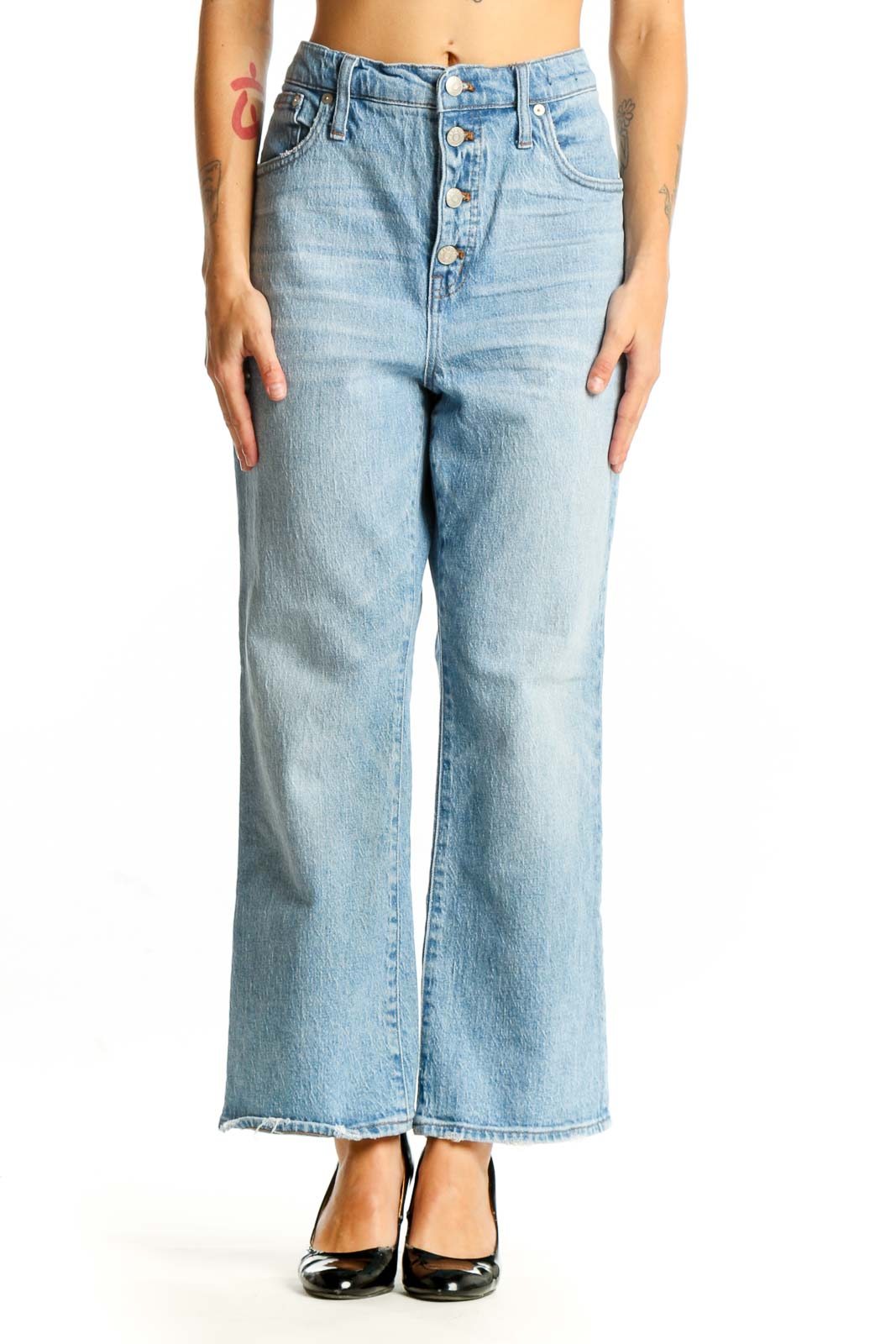Front view of Madewell light blue wide-leg jeans with button-fly closure