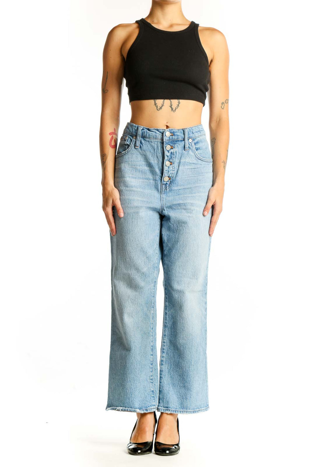 Front view of Madewell light blue wide-leg jeans with button-fly closure