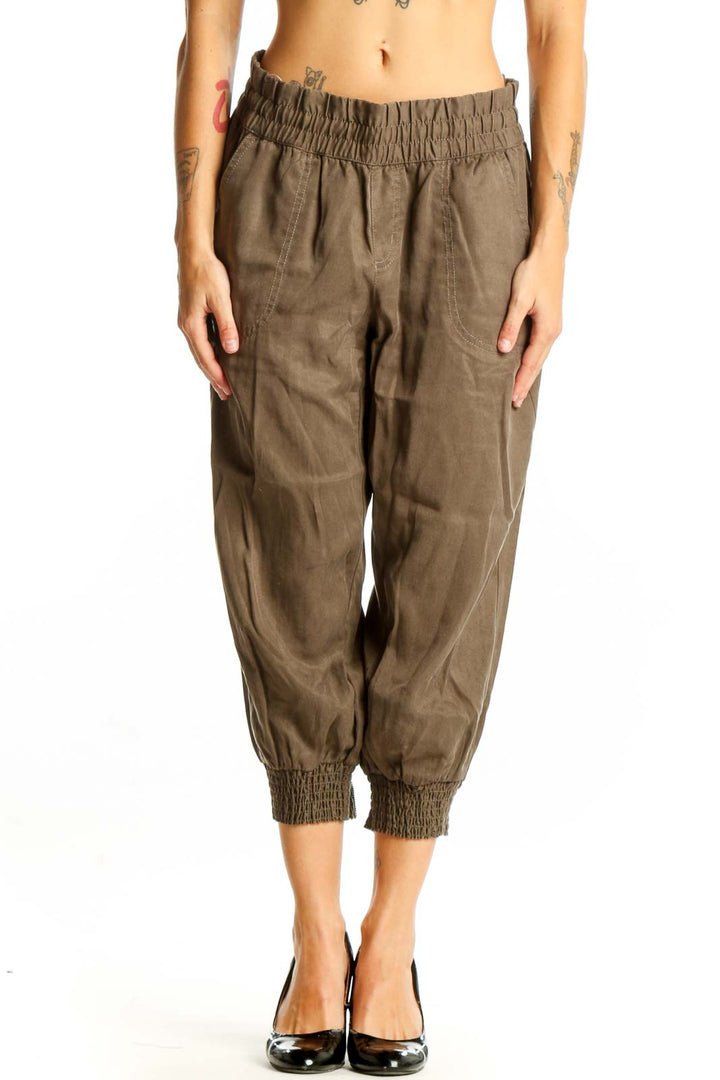 Front view of olive Athleta Lyocell cropped jogger pants