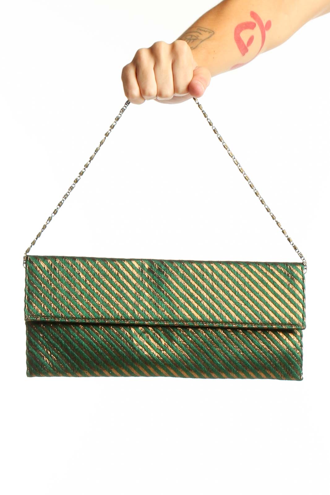 Front view of green metallic striped clutch with chain strap