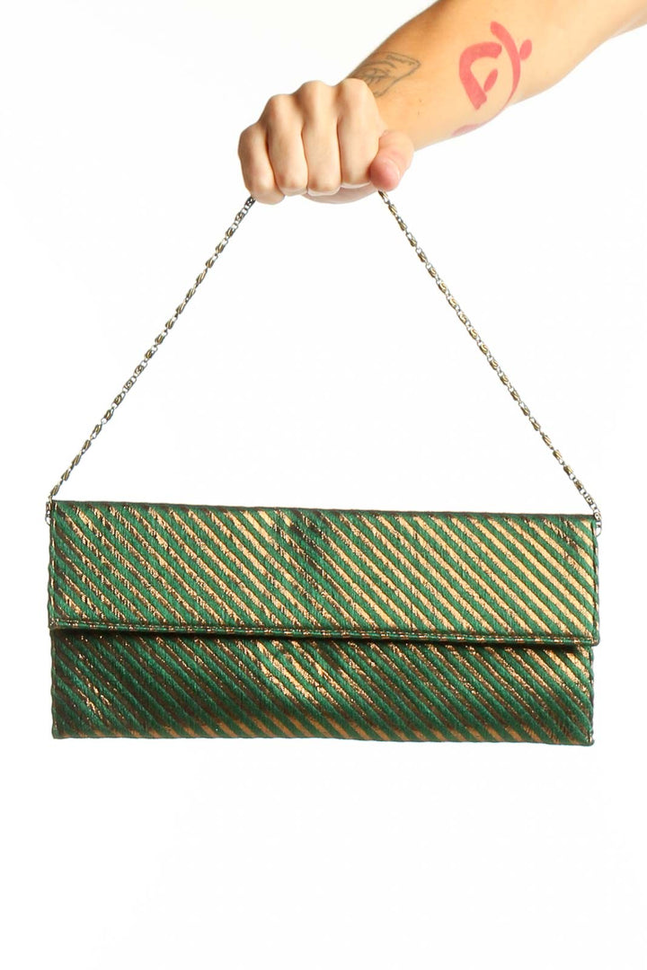 Front view of green metallic striped clutch with chain strap