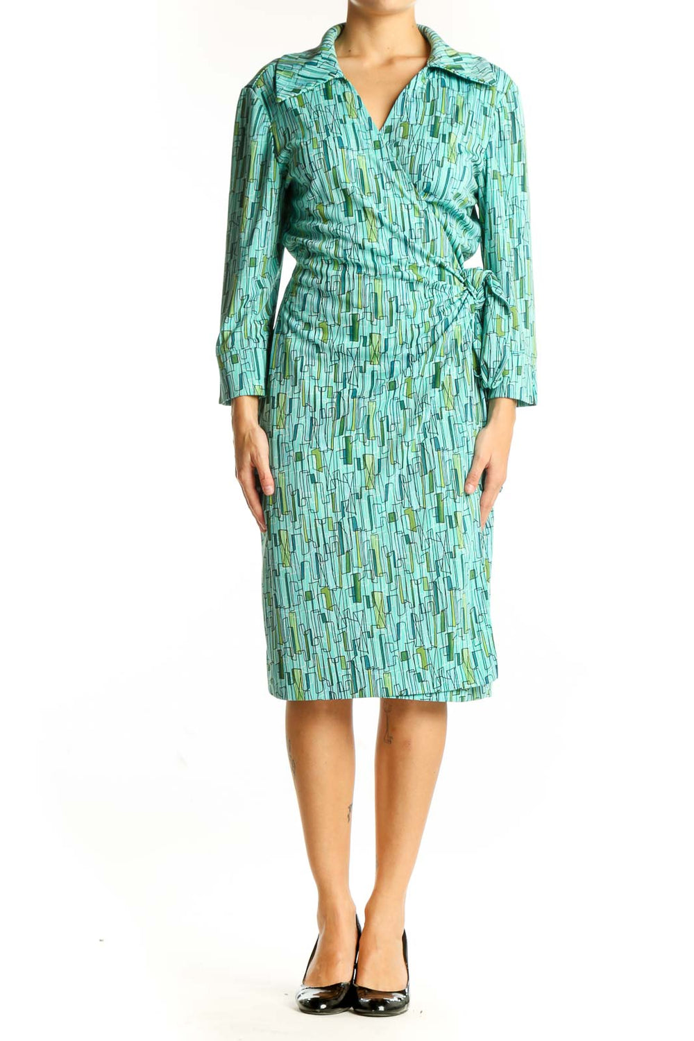 Front view of DANI-MAX teal geometric print wrap dress with long sleeves
