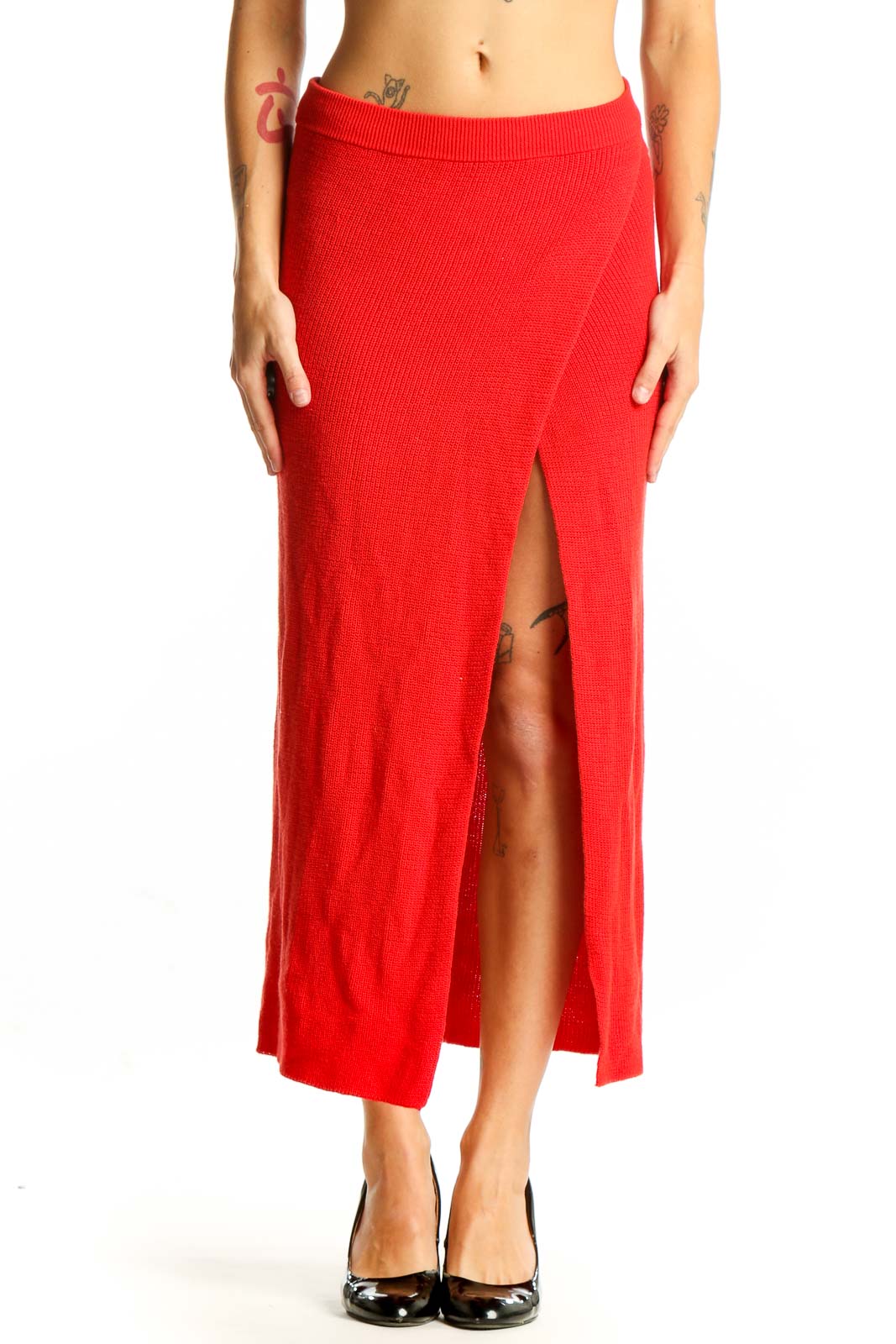 Front view of red ribbed knit maxi skirt with side slit
