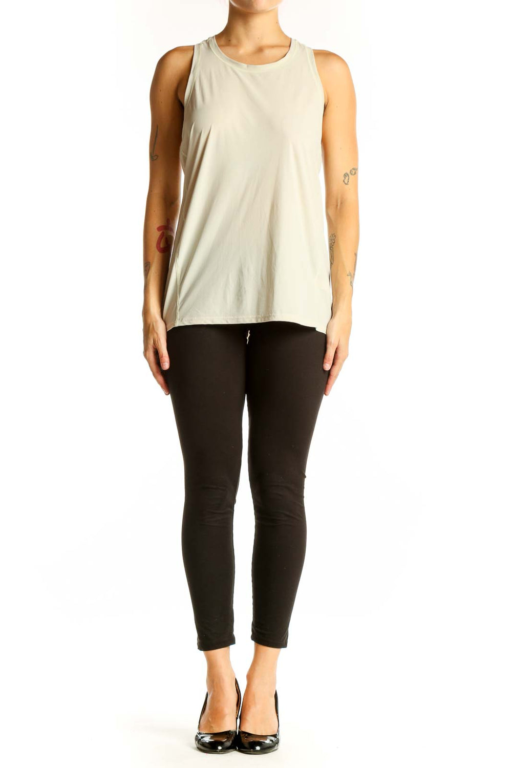 Front view of beige Athleta sleeveless athletic tank top