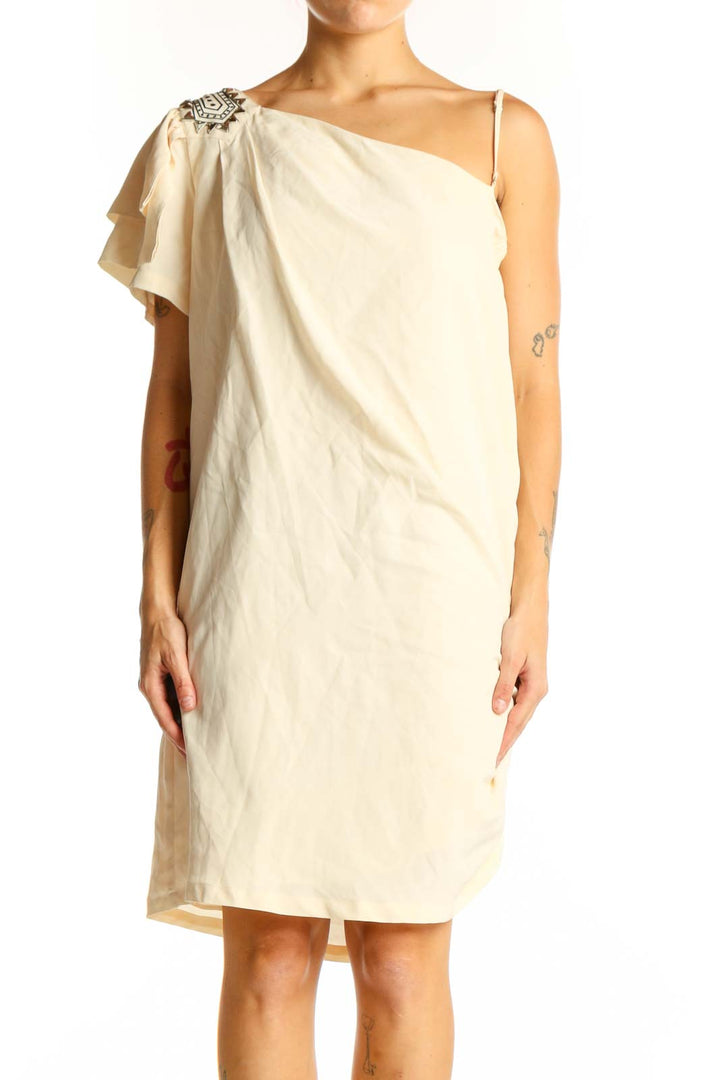 Front view of cream one-shoulder cocktail dress with embellished flutter sleeve