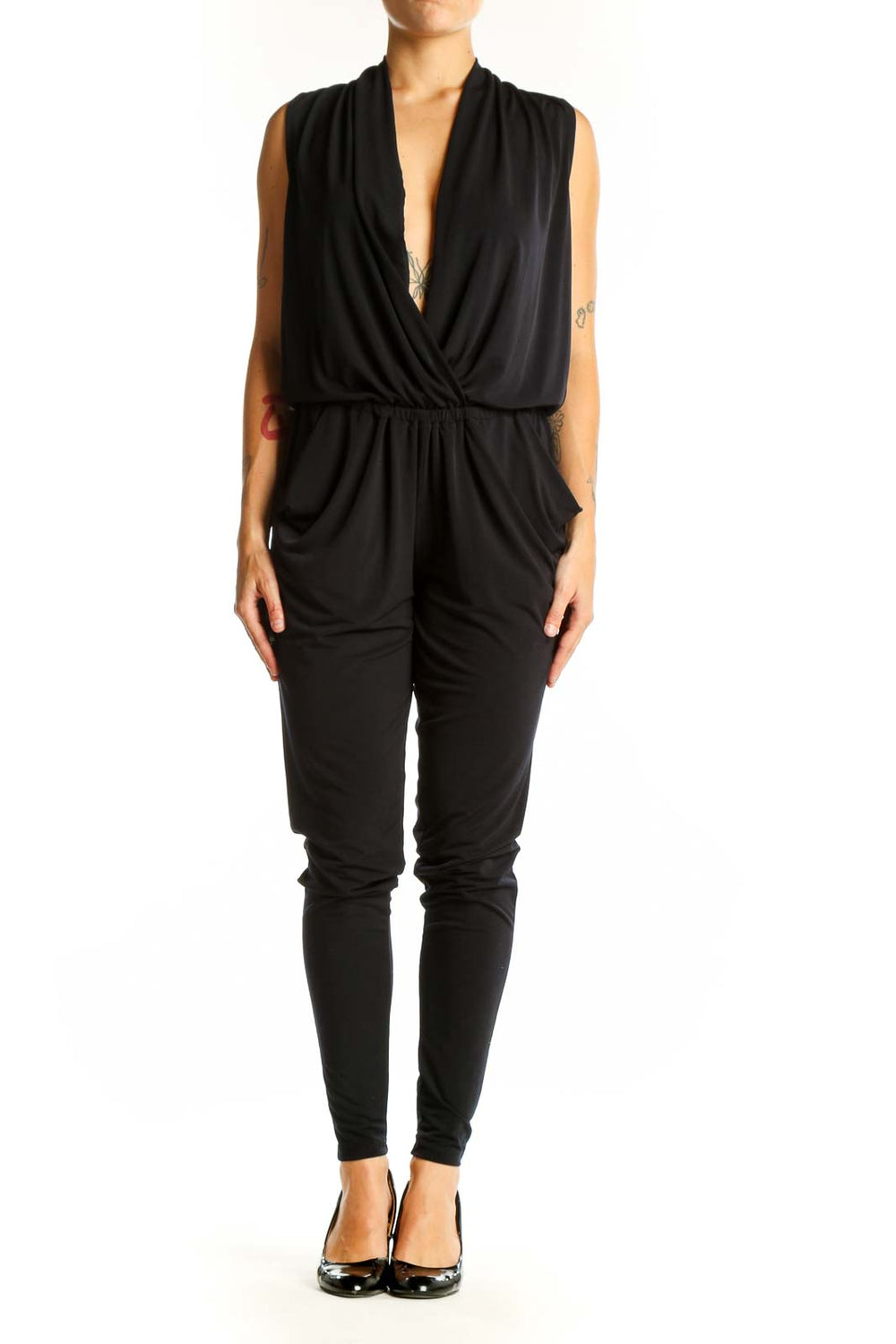 Front view of black MICHAEL Michael Kors wrap jumpsuit with plunging neckline