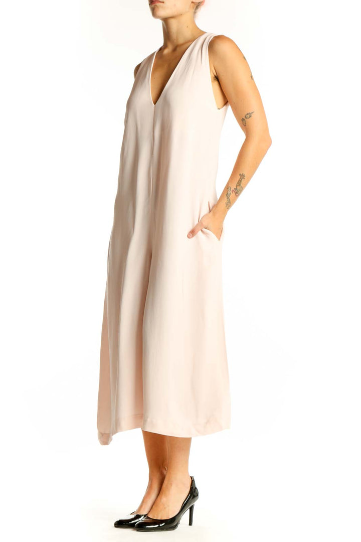 Front view of French Connection blush sleeveless V-neck midi jumpsuit