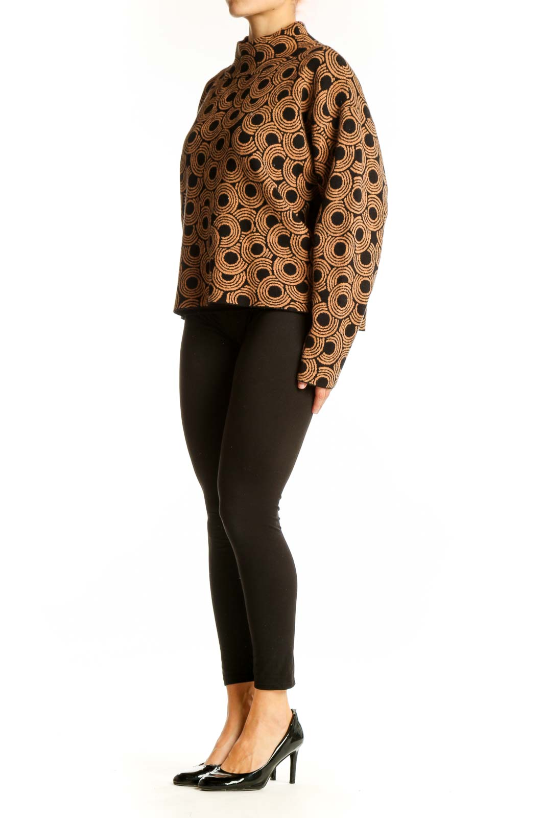 Front view of brown circular pattern mock neck sweater by Maeve