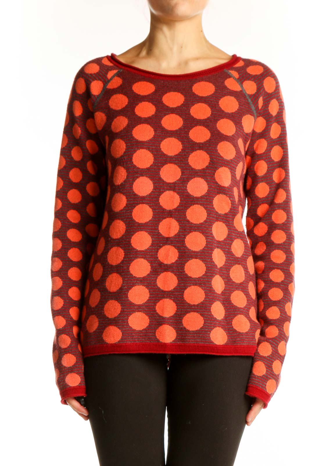 Front view of Title Nine red sweater with orange polka dots