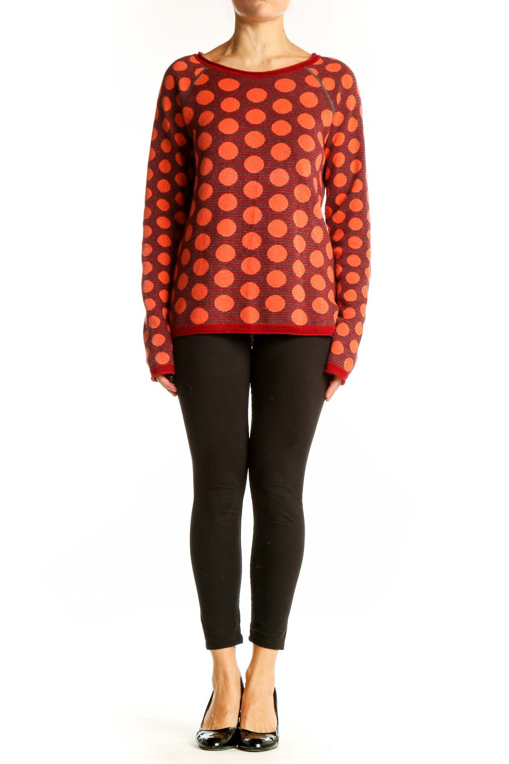 Front view of Title Nine red sweater with orange polka dots