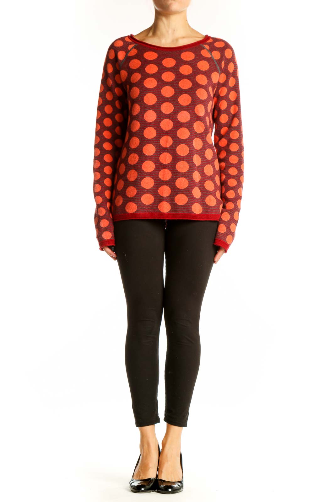 Front view of Title Nine red sweater with orange polka dots