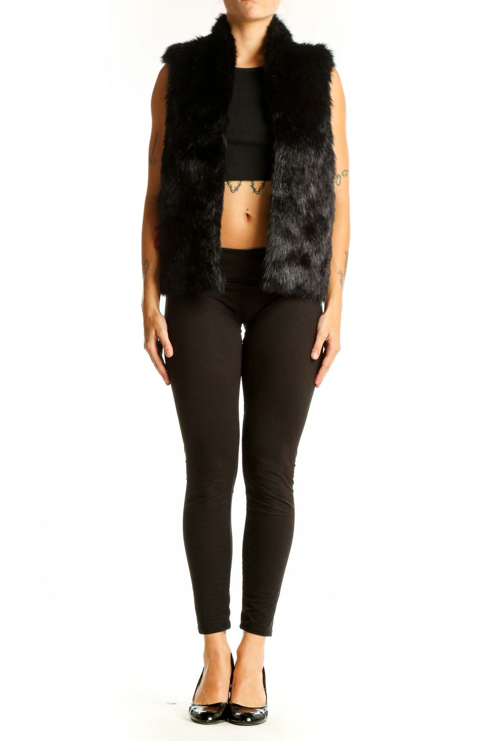 Front view of black faux fur sleeveless vest from Express