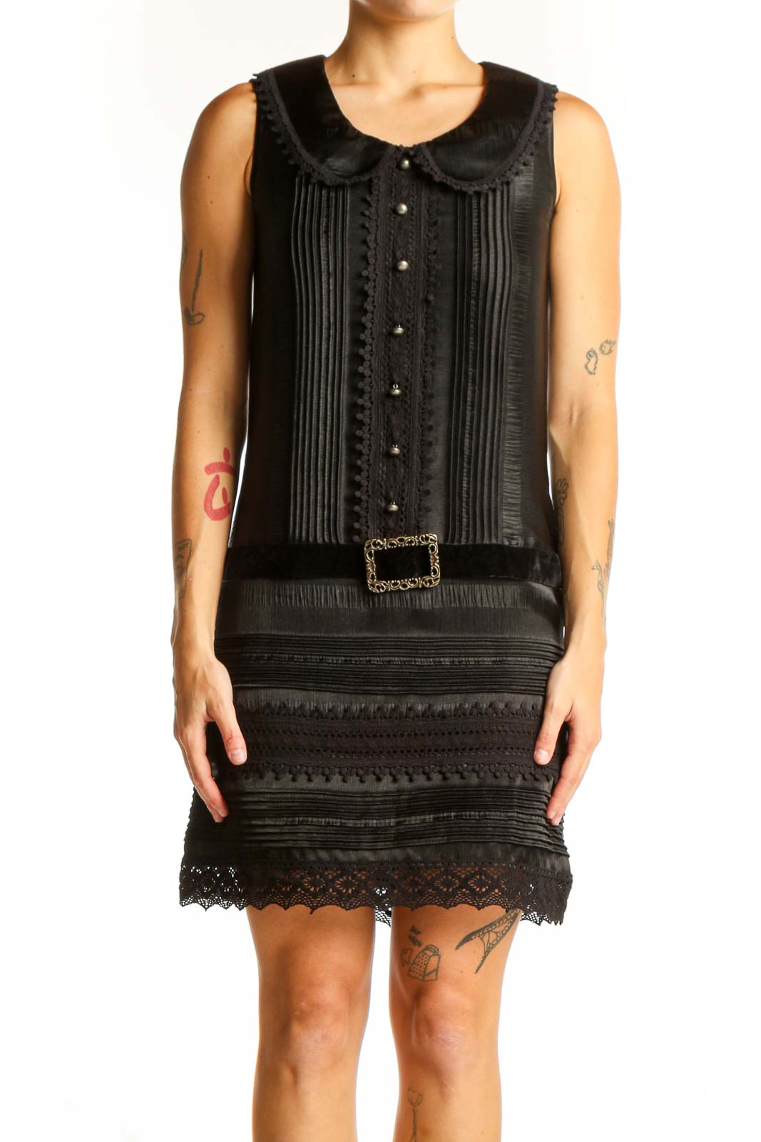 Front view of Anna Sui black vintage-inspired dress with lace trim and pintuck details