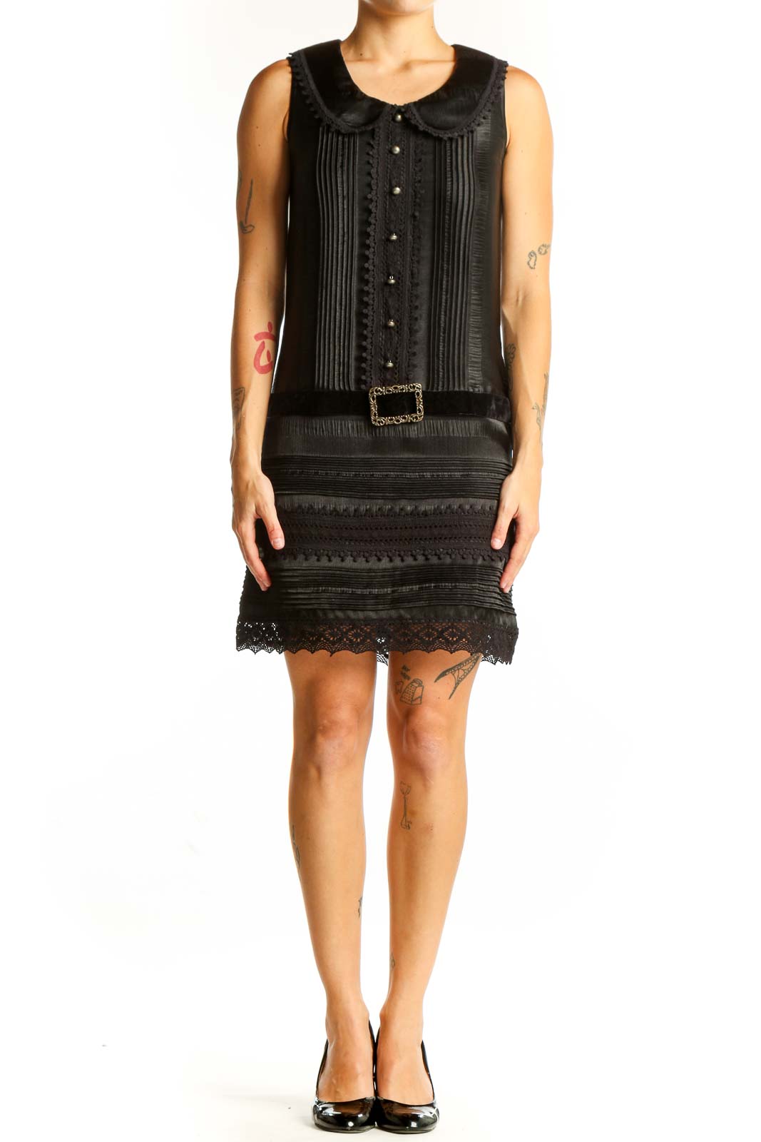 Front view of Anna Sui black vintage-inspired dress with lace trim and pintuck details