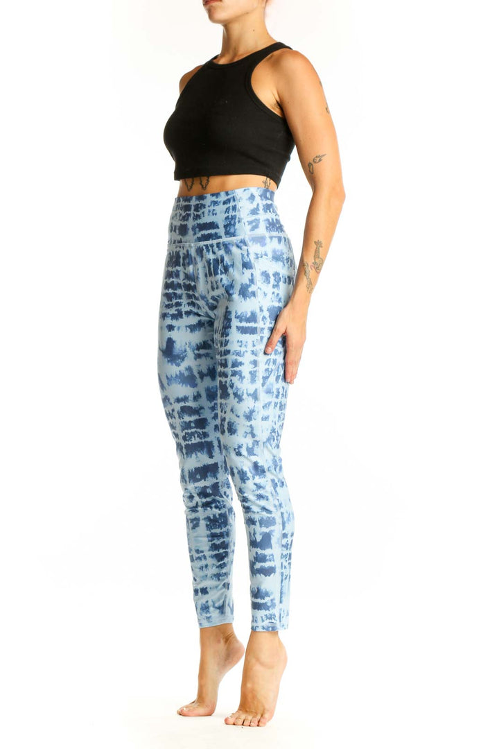 Front view of blue tie-dye high-waisted activewear leggings