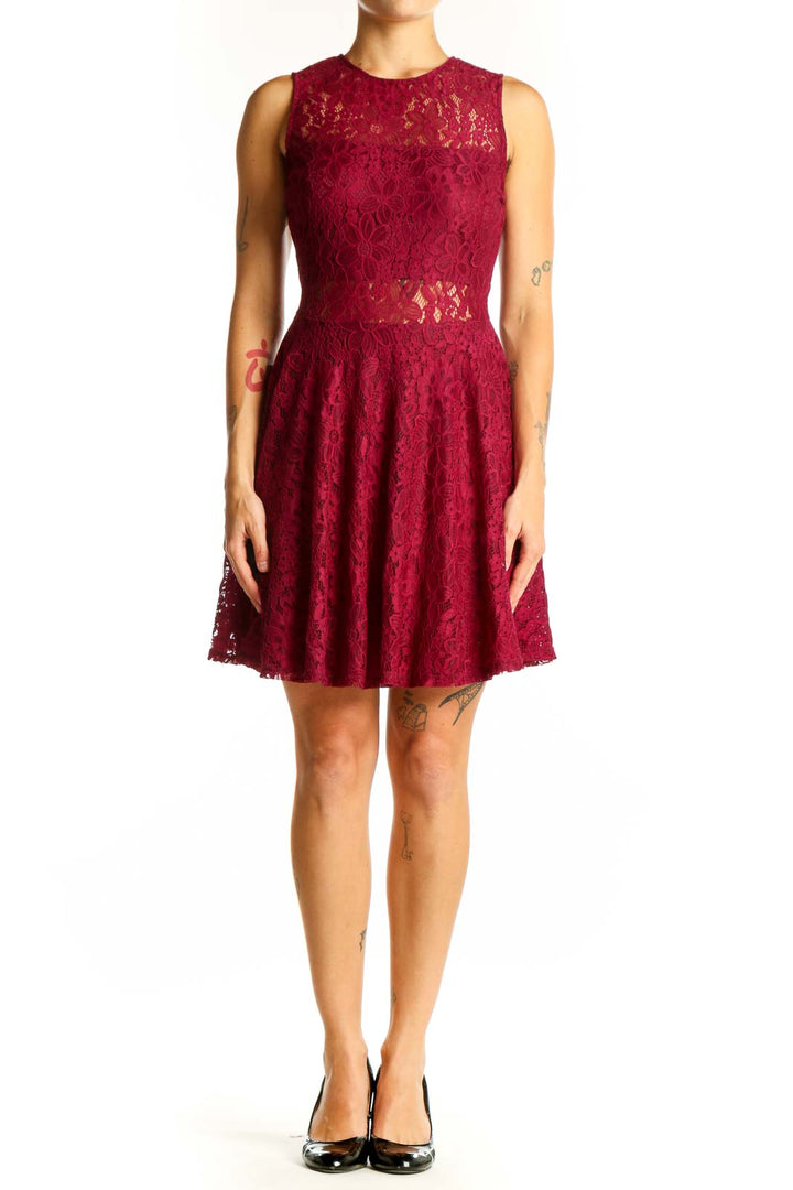 Front view of J.Crew burgundy lace sleeveless cocktail dress with A-line silhouette