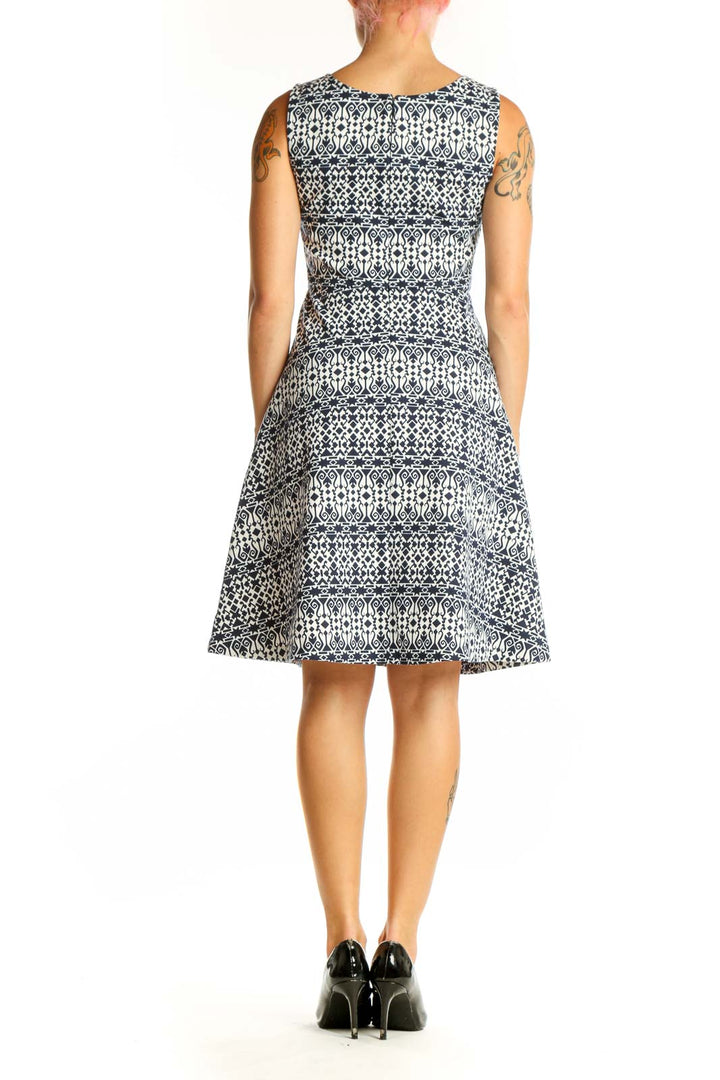 Side view of Talbots navy floral print sleeveless A-line dress