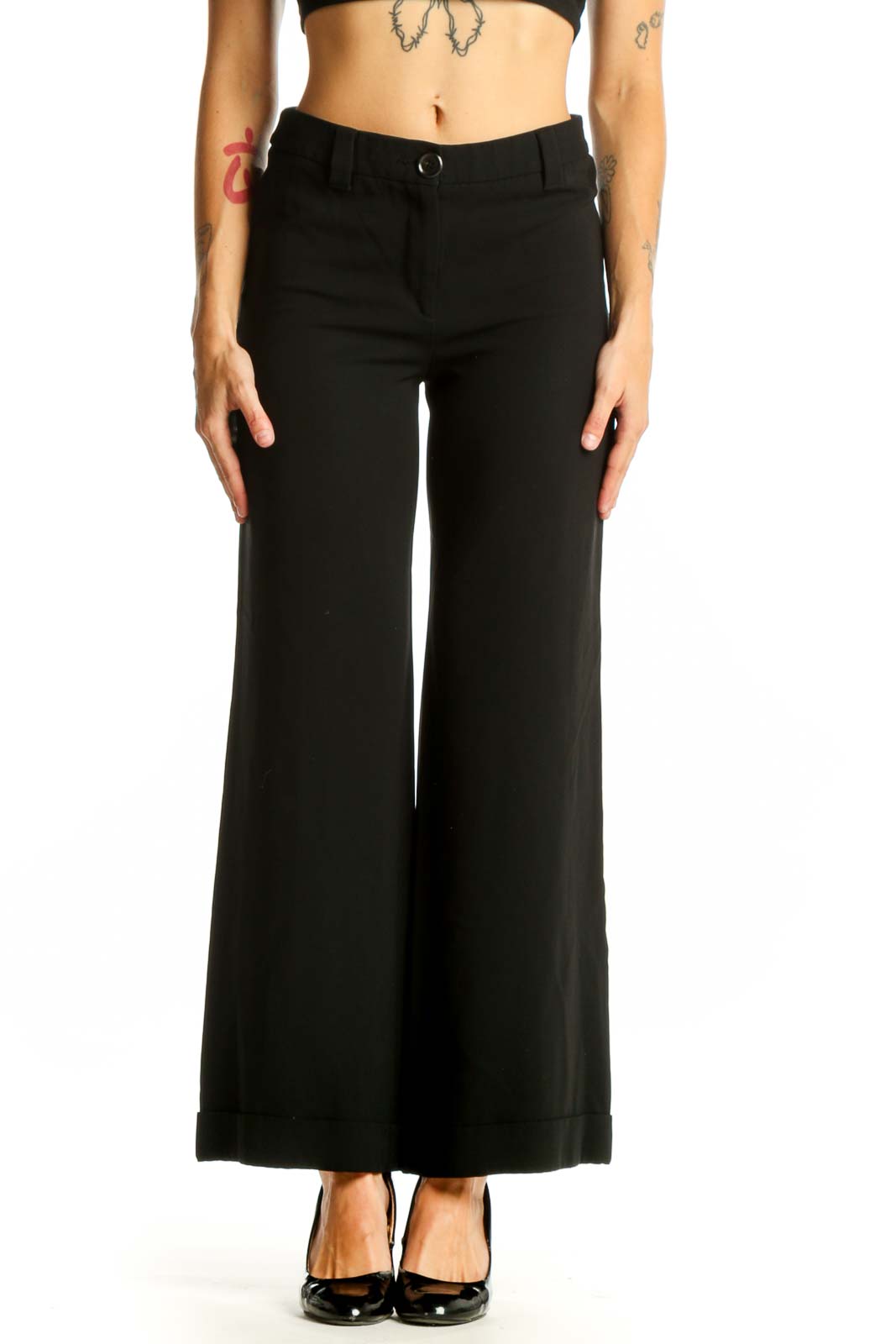 Front view of Moschino black wide-leg trousers on model