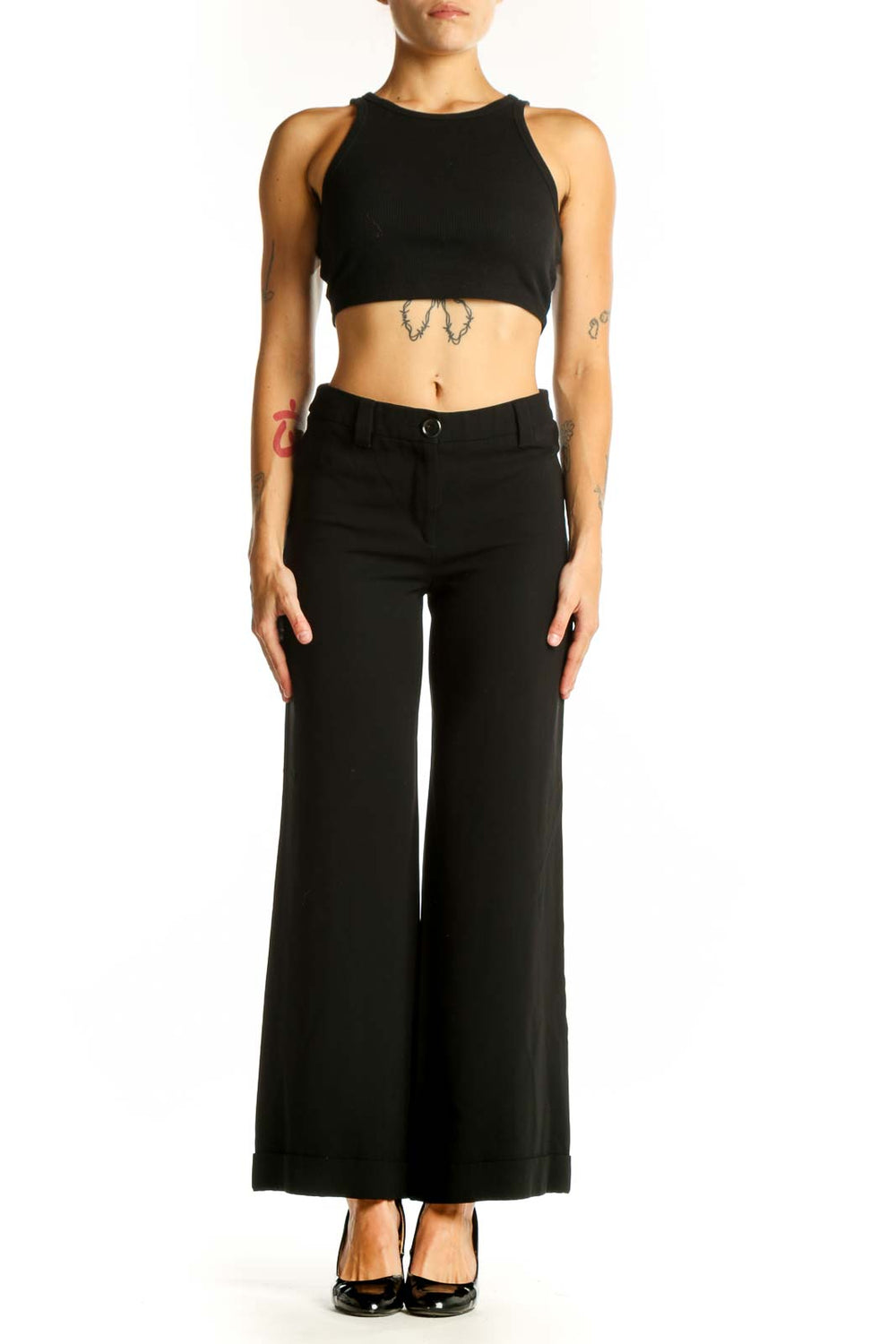 Front view of Moschino black wide-leg trousers on model