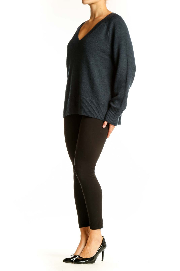 Front view of Banana Republic dark green V-neck knit sweater