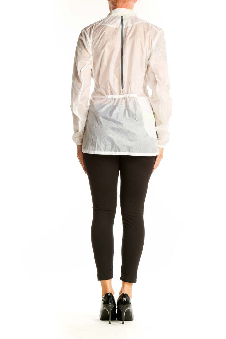 Side view of white Brooks activewear jacket on model