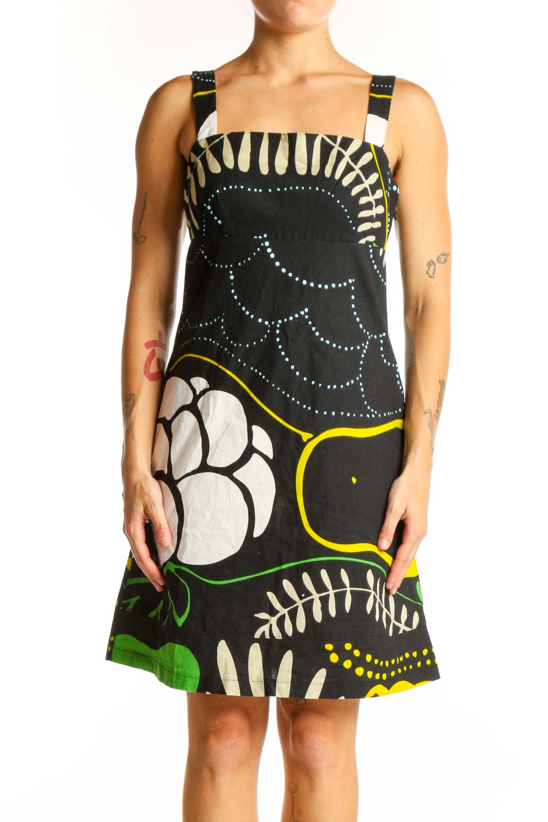 Front view of black floral print cotton sundress by Marimekko for Anthropologie