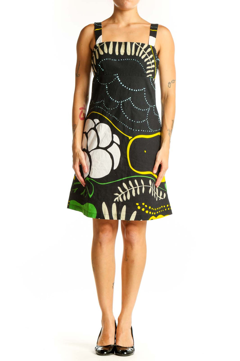 Front view of black floral print cotton sundress by Marimekko for Anthropologie