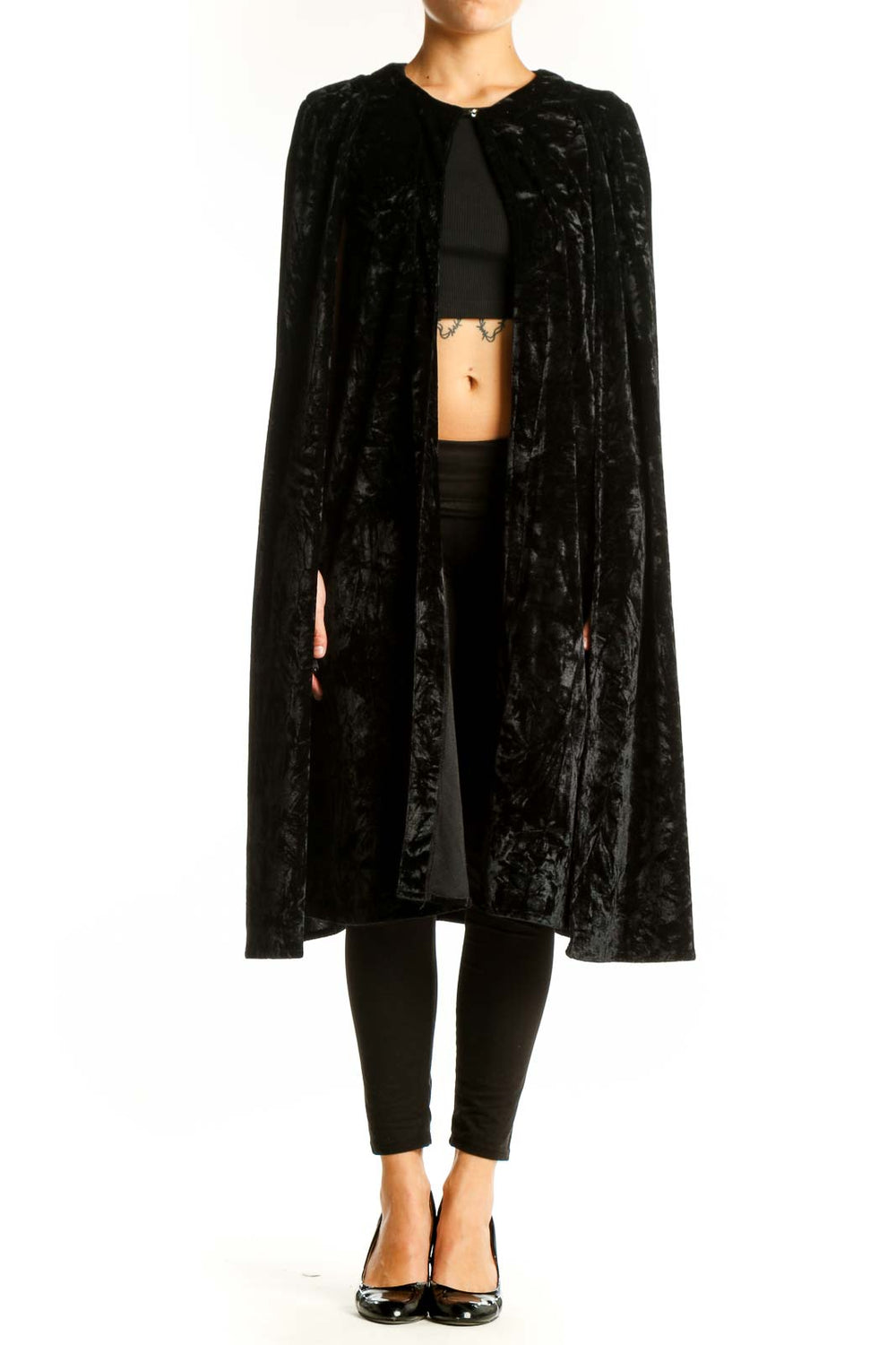 Front view of NastyGal black velvet cape jacket on model