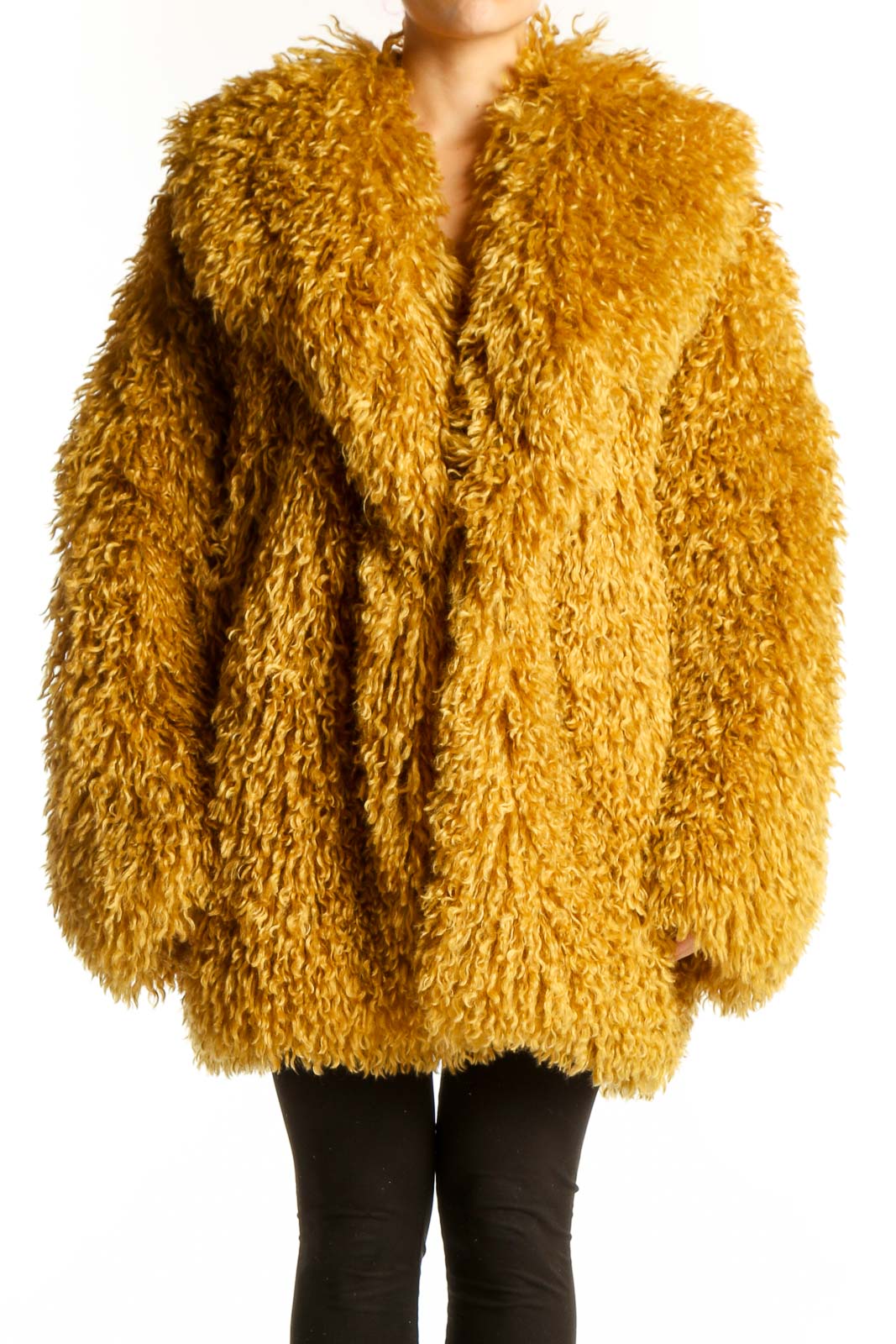 Front view of golden shaggy oversized faux fur jacket from Free People