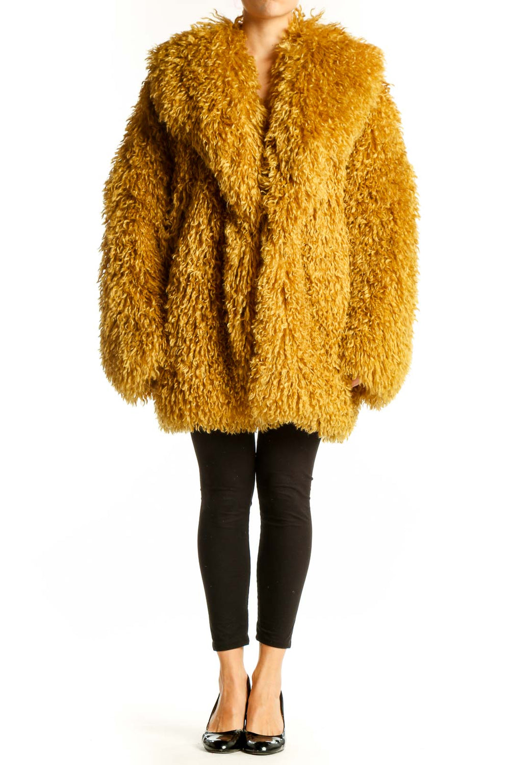 Front view of golden shaggy oversized faux fur jacket from Free People