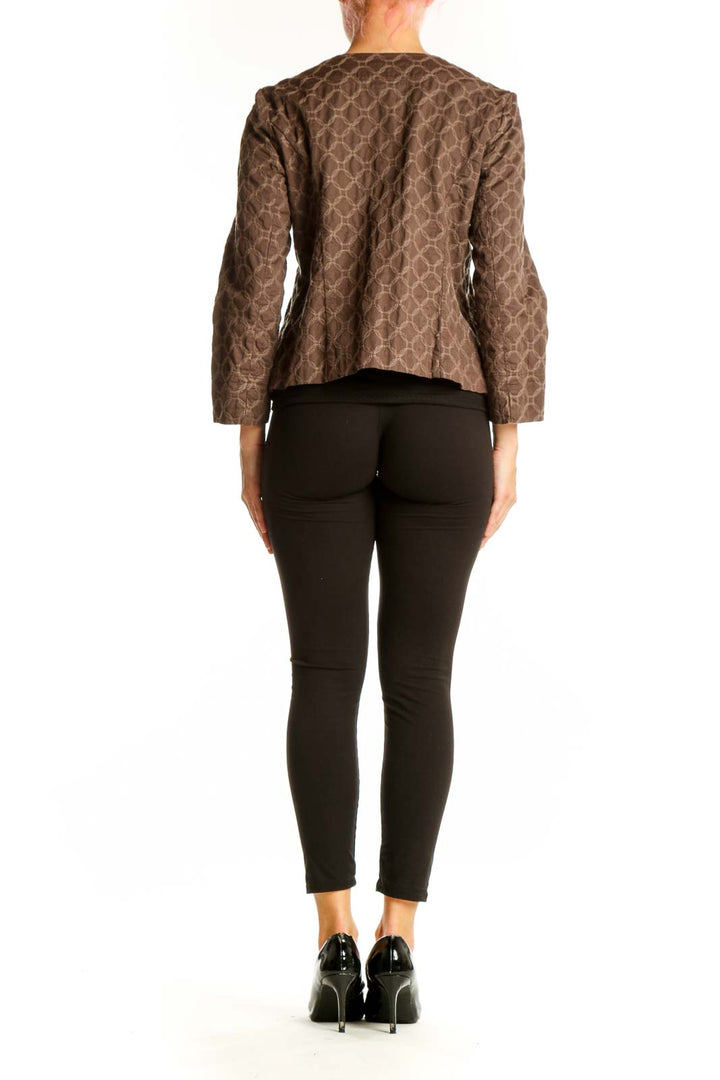 Side view of J.Jill brown geometric pattern quilted jacket on model