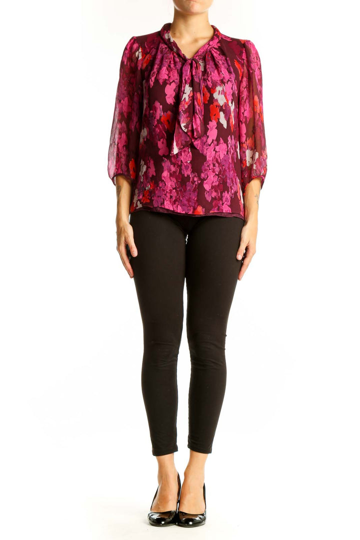 Front view of Tibi New York pink floral silk blouse with tie-neck