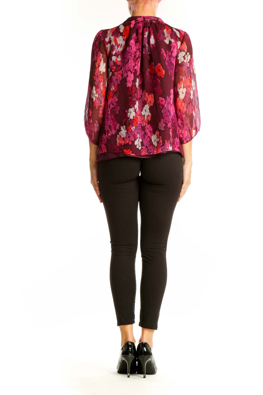Back view of Tibi New York pink floral silk blouse on model