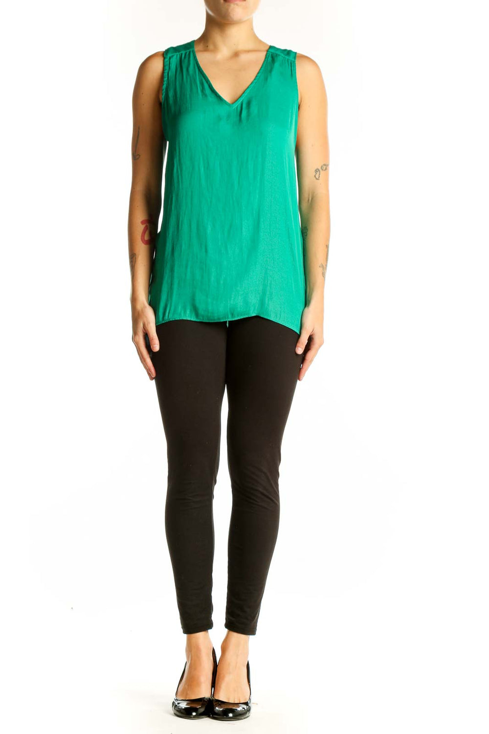 Front view of emerald green sleeveless V-neck blouse by Cupcakes and Cashmere