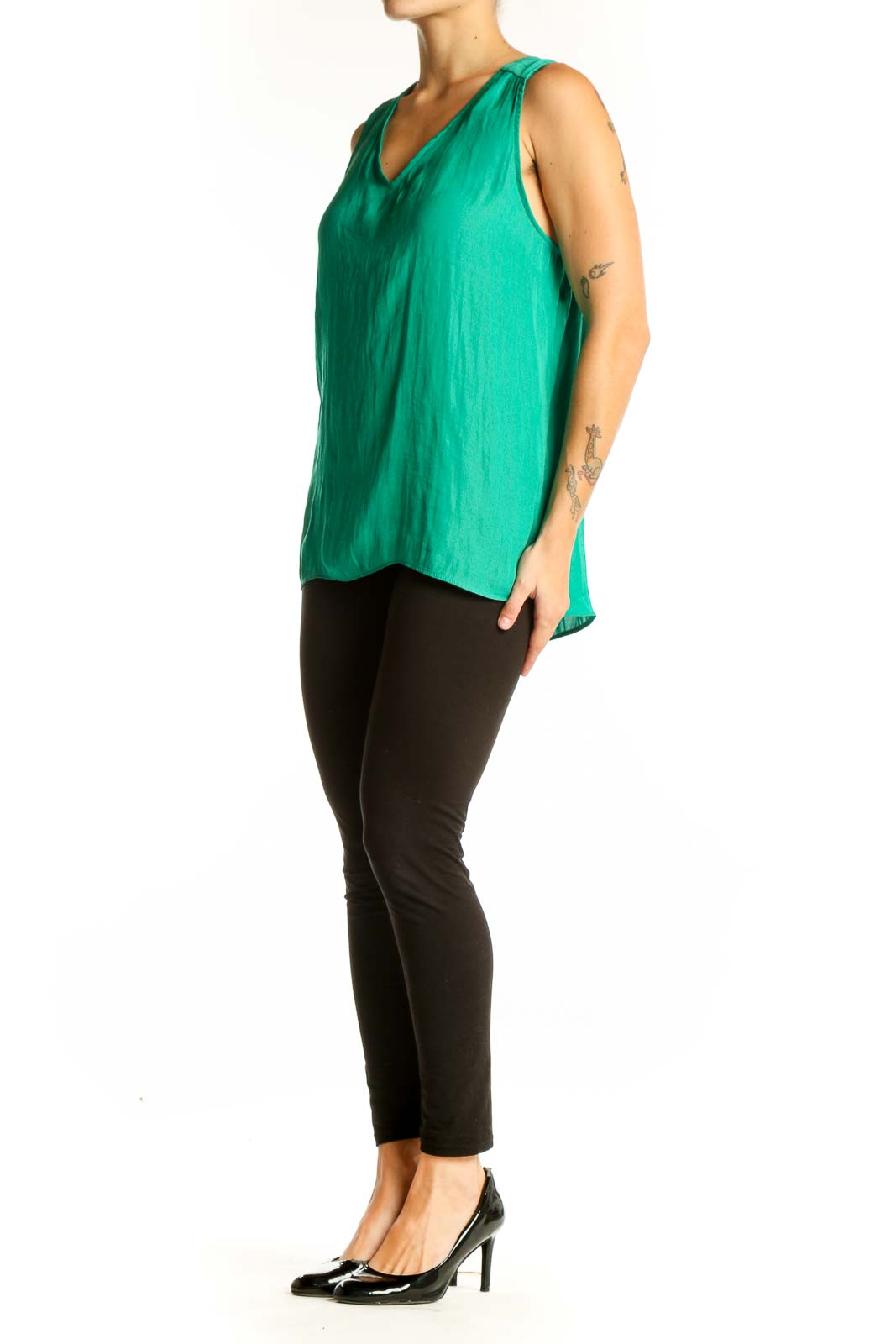 Front view of emerald green sleeveless V-neck blouse by Cupcakes and Cashmere