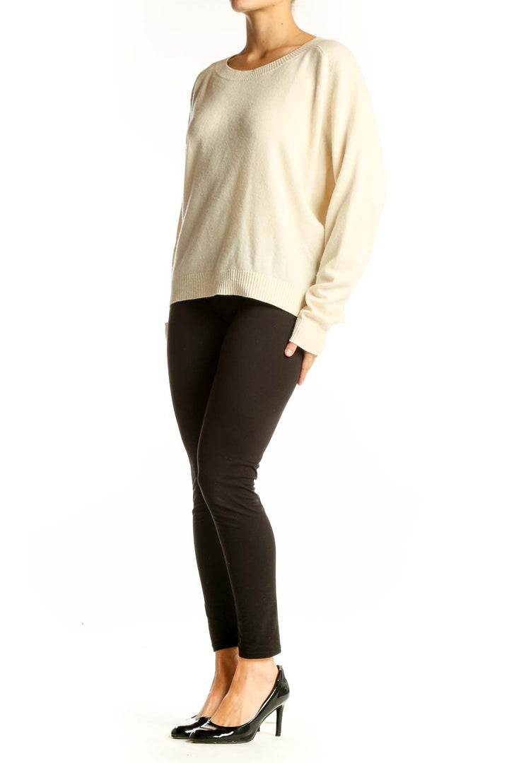 Front view of cream Vince cashmere oversized sweater