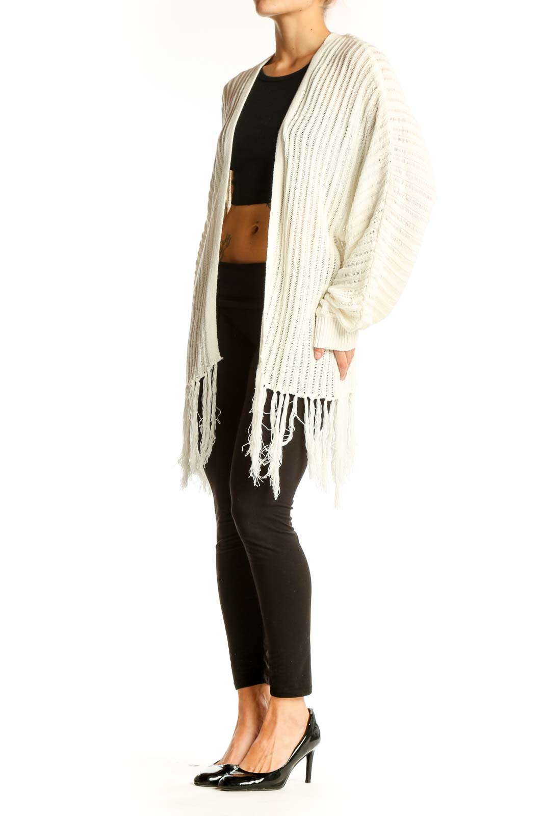 Front view of Fantastic Fawn cream ribbed cardigan with fringe detail