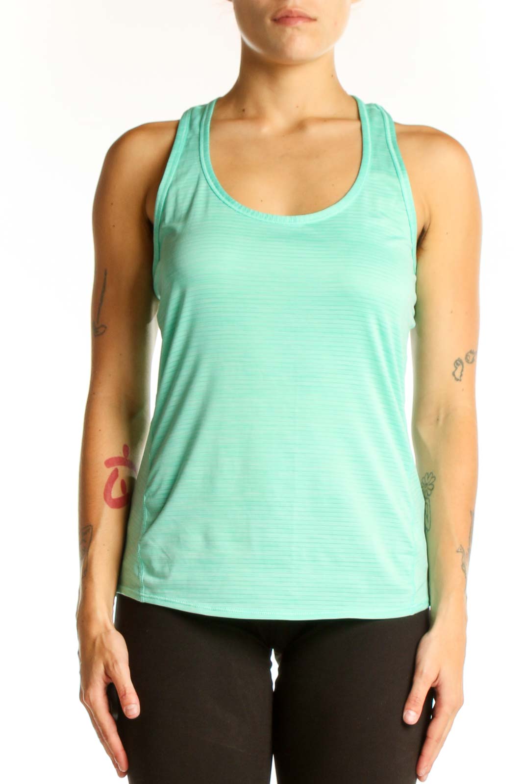 Front view of mint green Athleta racerback tank top
