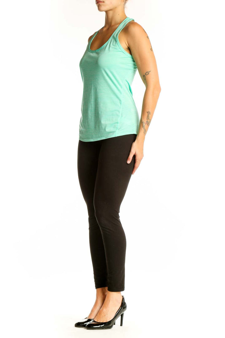 Front view of mint green Athleta racerback tank top