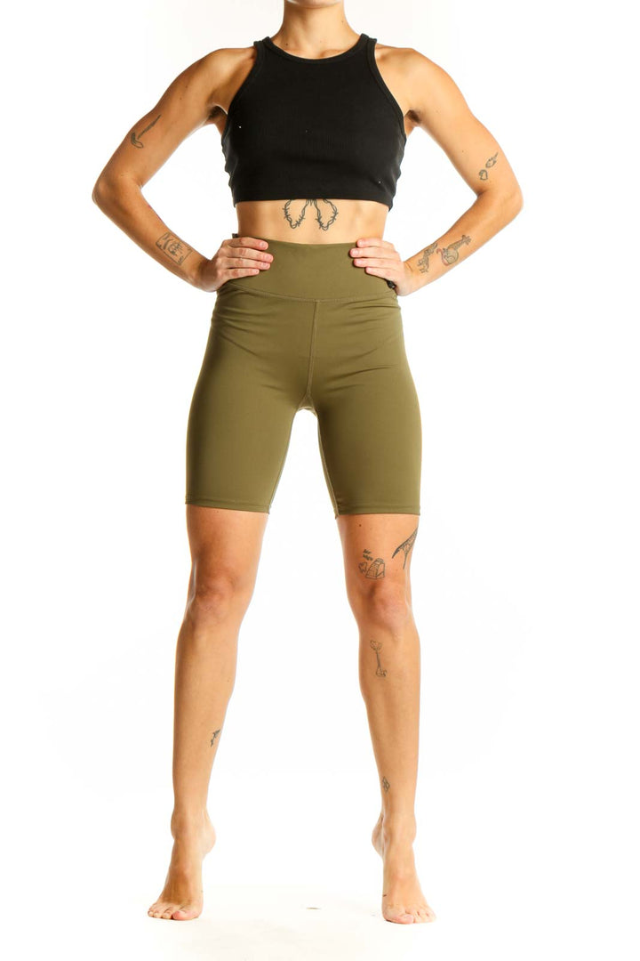 Front view of olive Madewell high-waisted biker shorts