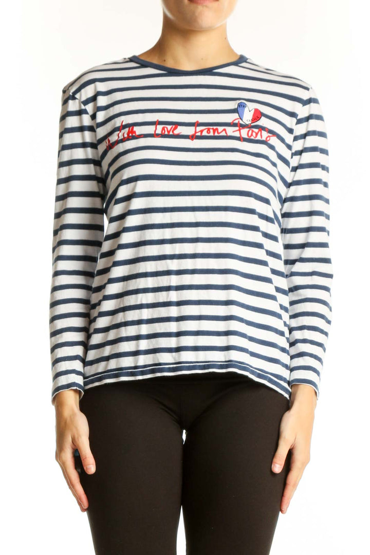 Front view of Etre cecile navy striped long sleeve top with French embroidery
