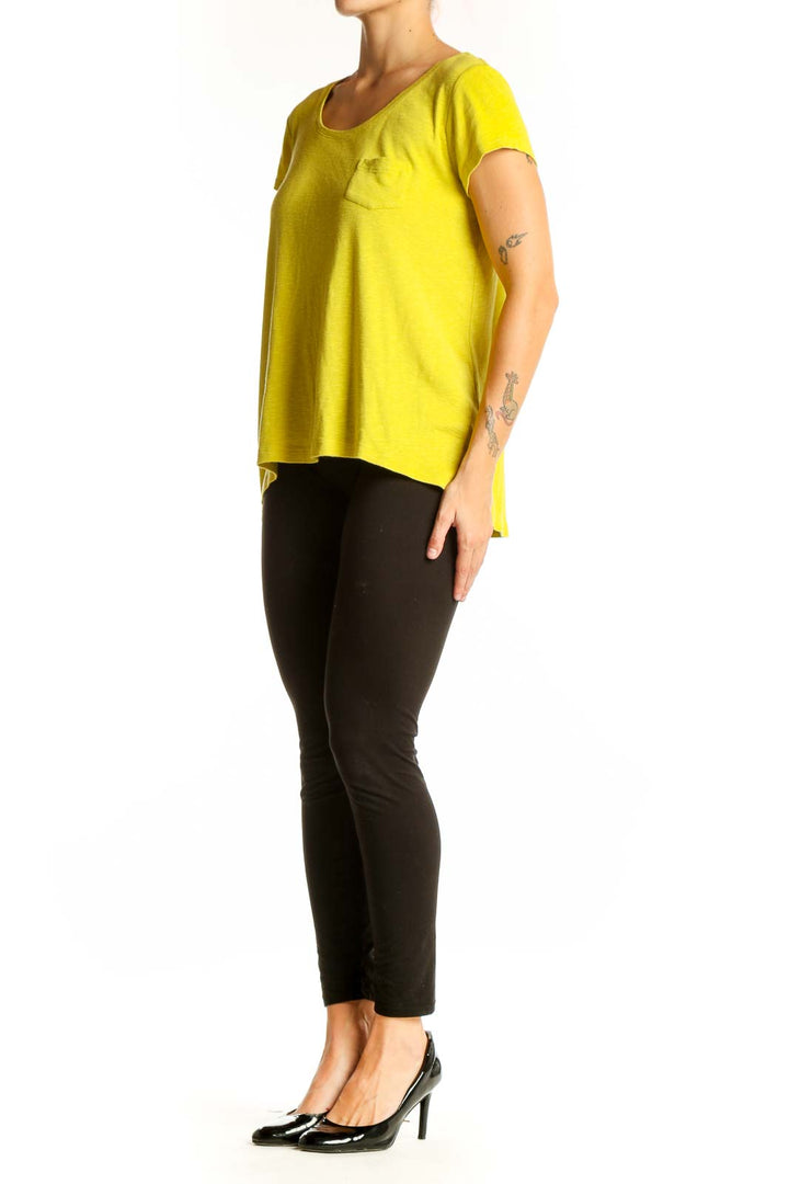 Front view of yellow Cynthia Rowley scoop neck t-shirt with chest pocket