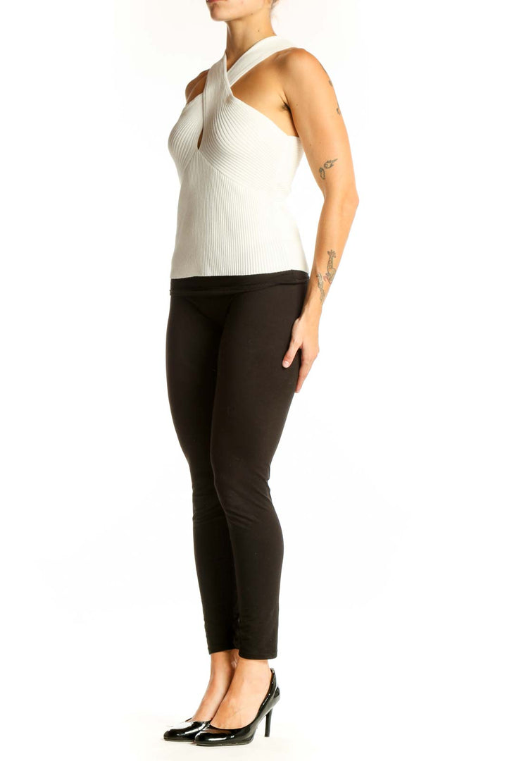 Front view of white ribbed crossover halter top from Mangolia Boutique