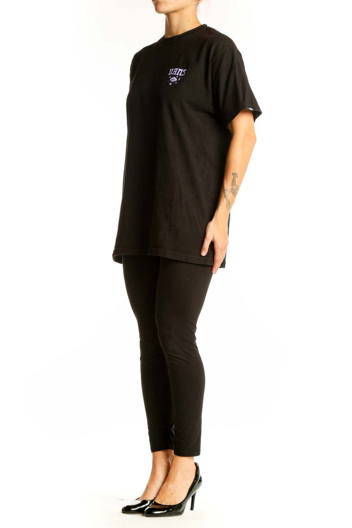 Front view of black Vans t-shirt with purple logo
