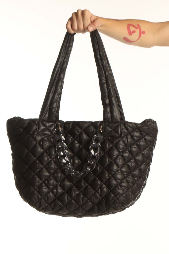 Front view of Jill & Ally black quilted tote bag with long straps