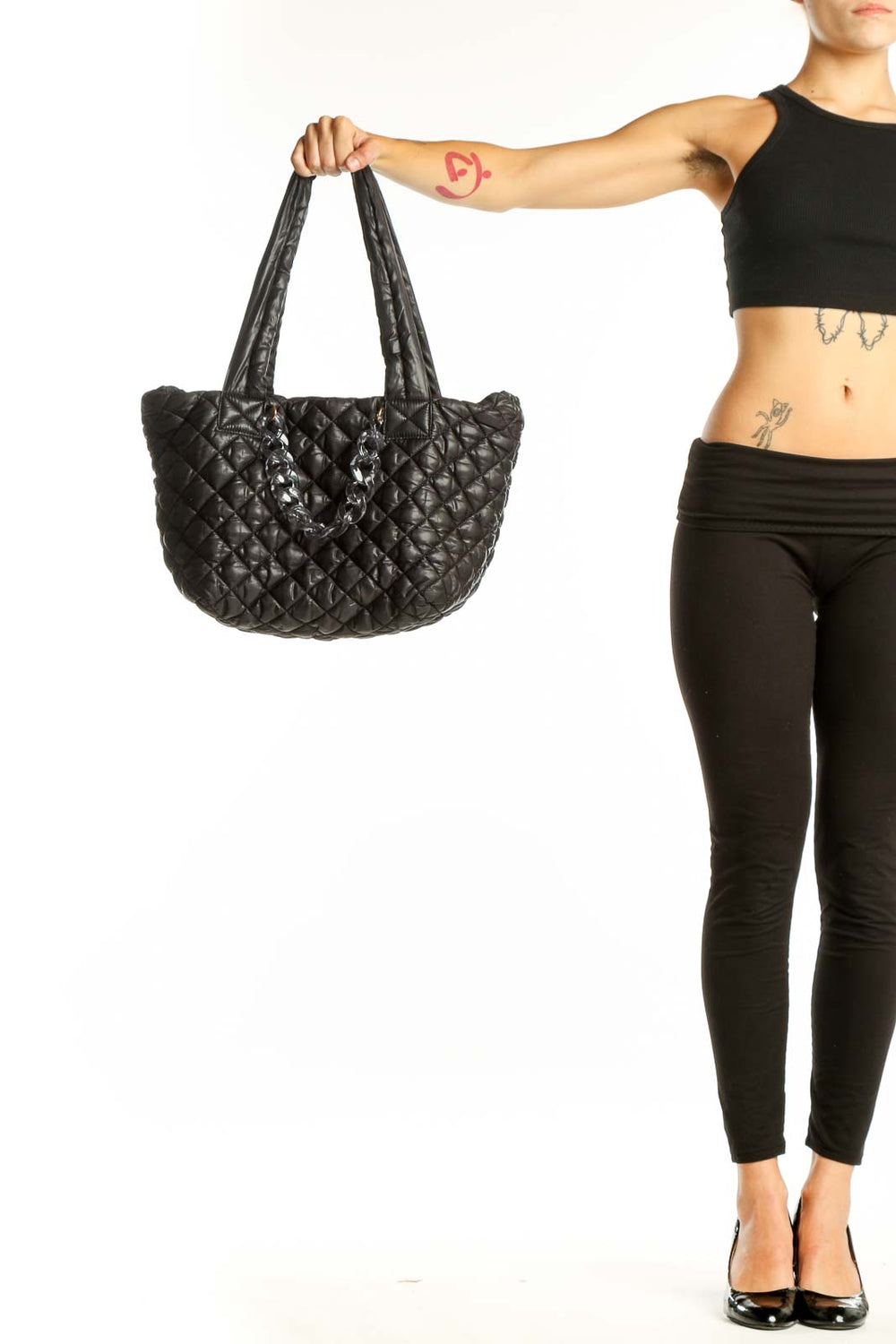Front view of Jill & Ally black quilted tote bag with long straps