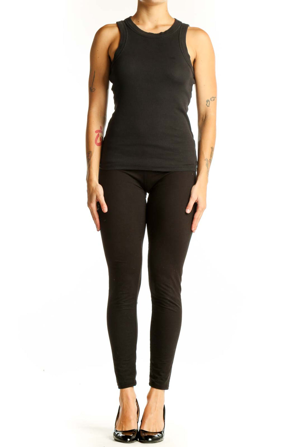 Front view of black Madewell sleeveless tank top on model