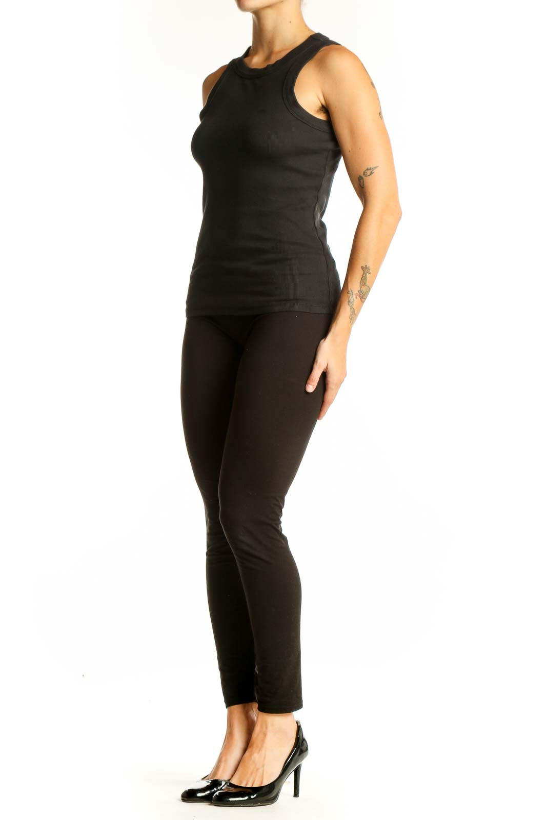 Front view of black Madewell sleeveless tank top on model