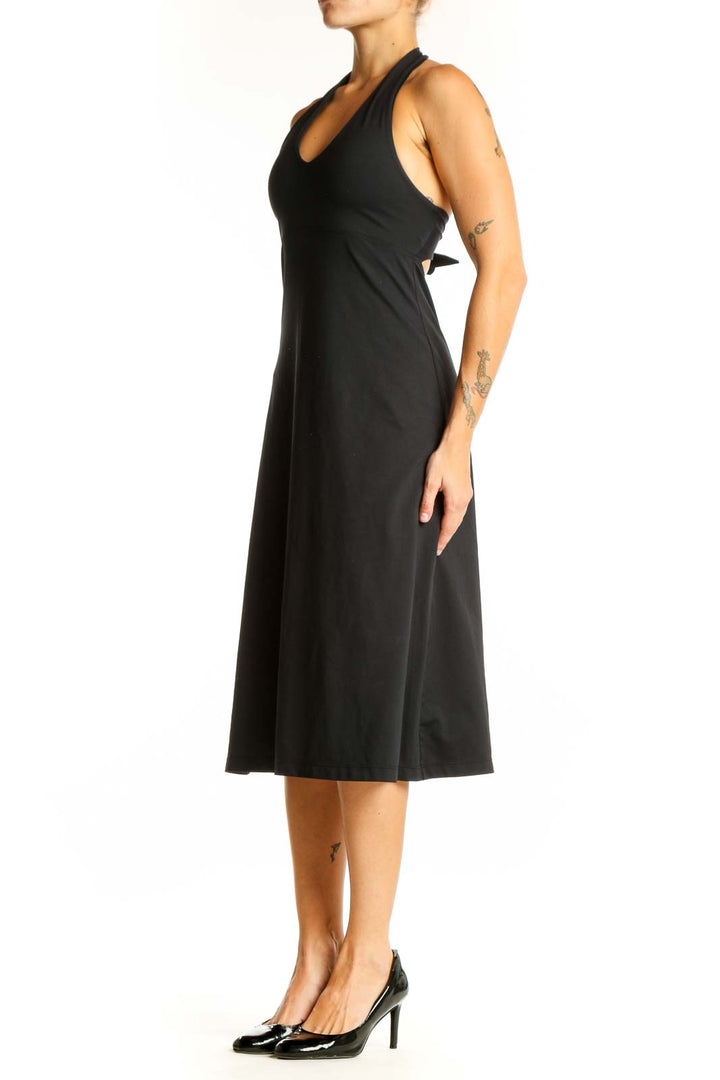 Front view of black Patagonia halter neck midi dress